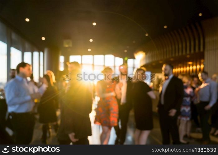 Blurred photo Crowd of unrecognizable business people standing and talking together in exhibition event at conference hall, meeting and seminar, lifestyle and leisure, celebration and party concept