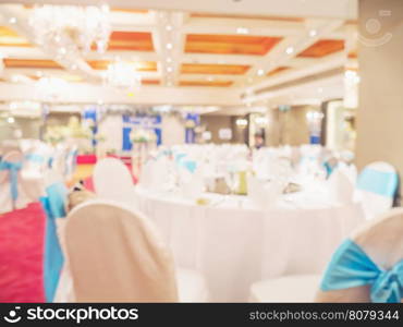 Blurred photo of empty table of wedding reception in a hotel