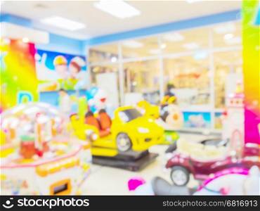 Blurred photo of toy arcade game area