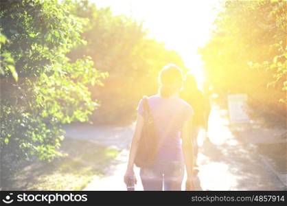 Blurred photo of walking woman on sunrise. walking woman on sunrise
