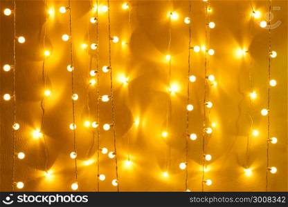 Blurred retro light bulb decor glowing for abstract background. Holiday or party background.