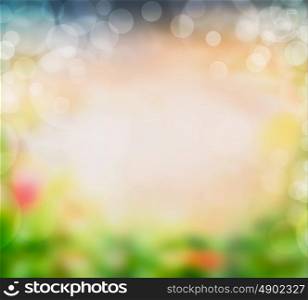 Blurred summer nature background with greens, sky, flowers and bokeh, frame