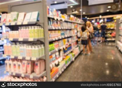 blurred supermarket product for background usage .