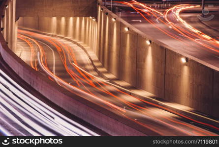 Blurred Tail Lights And Traffic Lights On Motorway