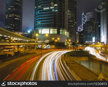 Blurred traffic in downtown district, Hong Kong, China.