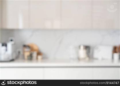 Blurred view of modern kitchen with white furniture. Blurred view of modern kitchen