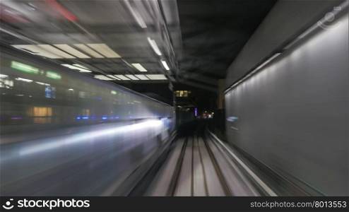 Blurred view on train&amp;#39;s motion in metropolitan tunnel