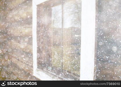 blurred wooden background with snow winter