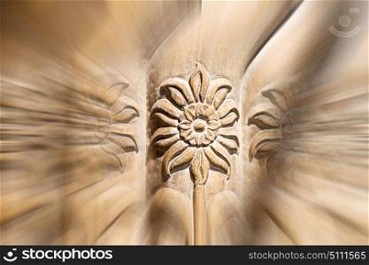 blurred zoom in old iran mousque the column incision of a flower like abstract background