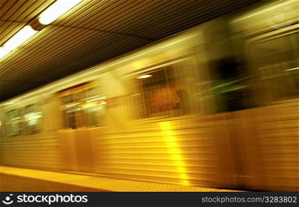 Blurring subway train.