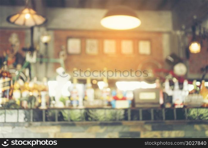 blurry background of coffee cafe with vintage light tone