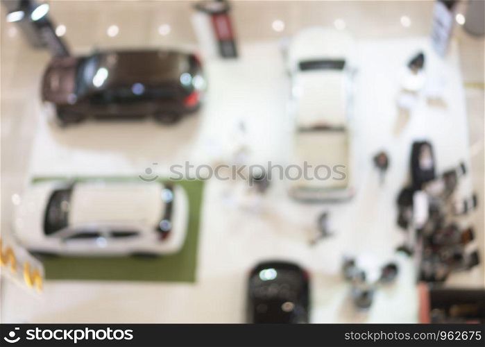 blurry background of motor show, car showroom