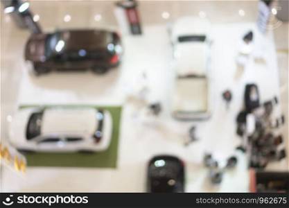 blurry background of motor show, car showroom