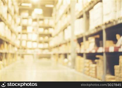 Blurry background of Warehouse inventory product stock for logis. Blurred image of shelf in modern distribution warehouse or storehouse. Defocused background of industrial warehouse interior aisle. Blurred image of shelf in modern distribution warehouse or storehouse. Defocused background of industrial warehouse interior aisle