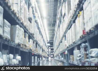 Blurry background of Warehouse inventory product stock for logis. Blurry background of Warehouse inventory product stock for logistic background. Blurry background of Warehouse inventory product stock for logistic background