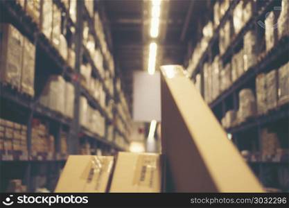 Blurry background of Warehouse inventory product stock for logistic background