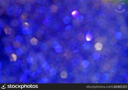 Blurry bright blue bokeh as background