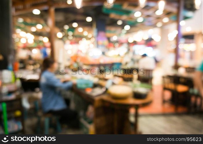 Blurry image of a restaurant interrior background.