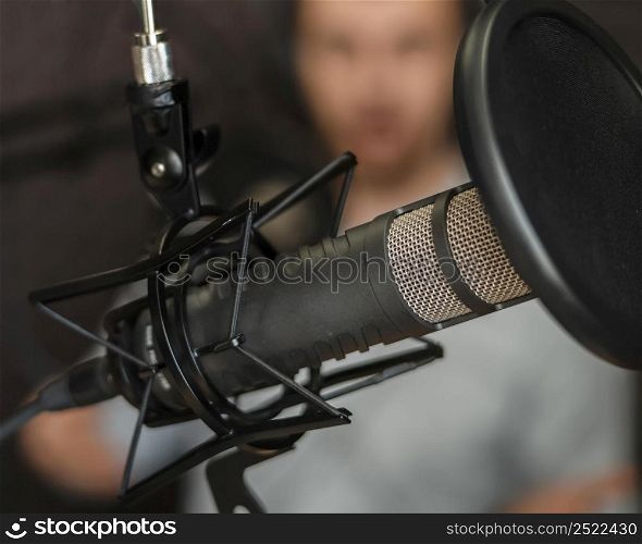 blurry man with radio equipment close up