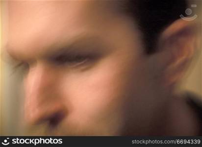 Blurry Photo of a Man&acute;s Face