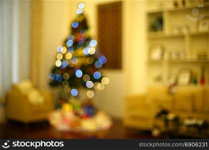 blurry photo of christmas tree in living room