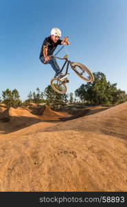 Bmx Table Top on a dirt track.