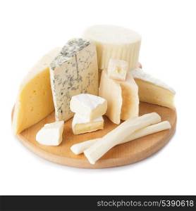 Board with pieces of various types of cheese on the board