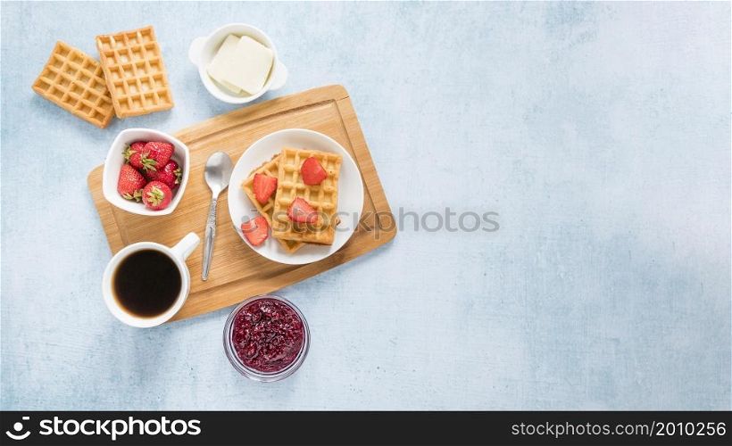 board with waffles fruits with copy space