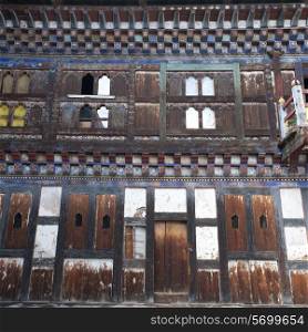 Boarded windows at the Wangdichholing Palace Bumthang District, Bhutan