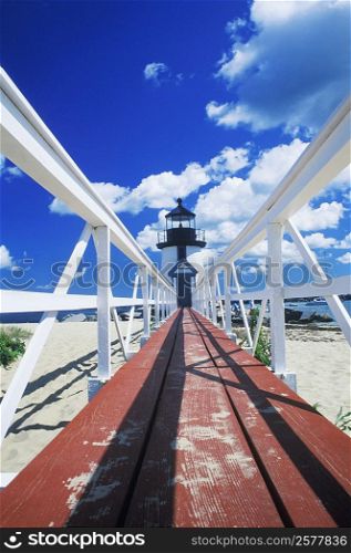 Boardwalk leading to a lighthouse, Cape Cod, Massachusetts, USA
