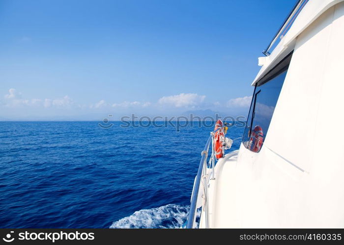 Boat bow sailing in blue Mediterranean sea in summer vacation