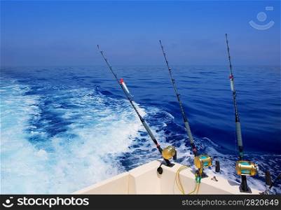 boat fishing trolling in deep blue ocean offshore in Mediterranean sea