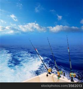 boat fishing trolling in deep blue ocean offshore in Mediterranean sea