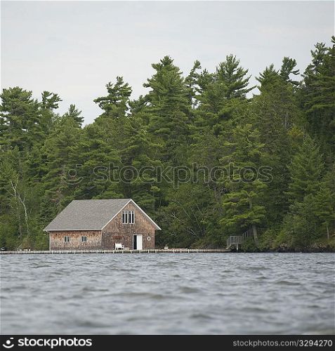 Boat house at shoreline at Lake of the Woods, Ontario