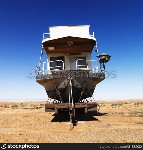 Boat in desert landscape