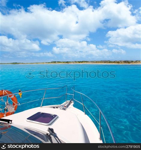 Boat in Formentera island transparent water on llevant beach