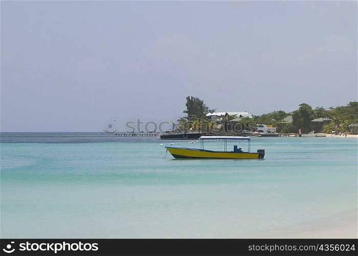 Boat in the sea, West Bay Beach, Roatan, Bay Islands, Honduras