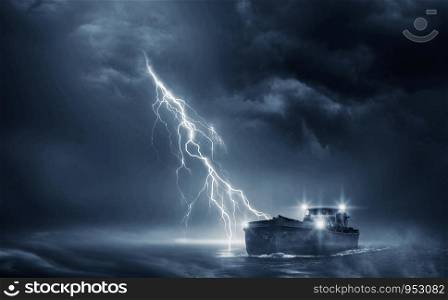 Boat in the thunderstorm in the ocean