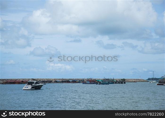 Boat moored ships at sea. Adjacent to the river bank for a trip to the islands.
