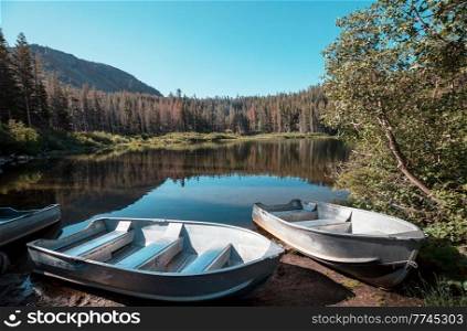 Boat on a beautiful mountains lake 