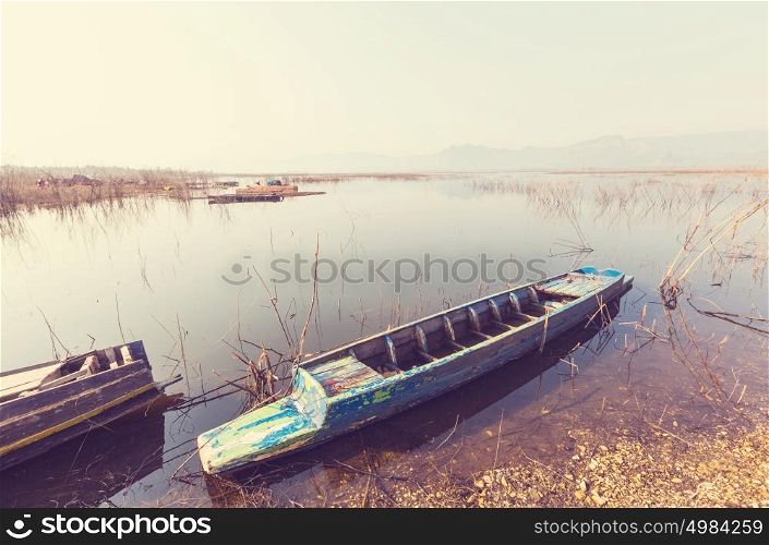 Boat on lake in Northern Thailand.
