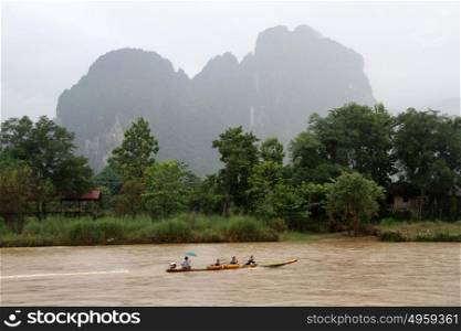 Boat on the riverand mountain in Vang Vieng, Laos