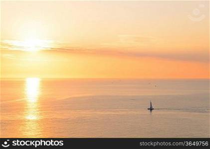 boat silhouette at sunset sea