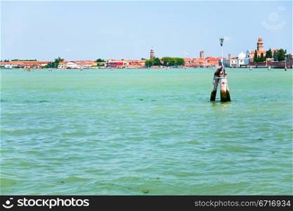 boat traffic poles in Venetian Lagoon, Italy