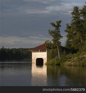 Boathouse at lakeside, Lake Of The Woods, Ontario, Canada