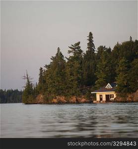 Boathouse at shoreline in Lake of the Woods, Ontario