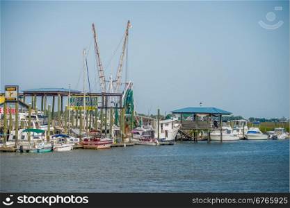 boats and fishing boats in the harbor marina