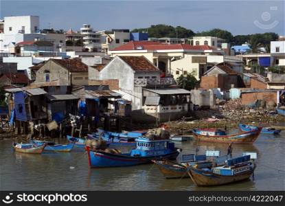 Boats and houses in Nha Trang, cventral Vietnam