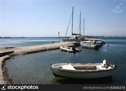 Boats and sailing boats at Loutraki,the second harbor of Skopelos island,Greece