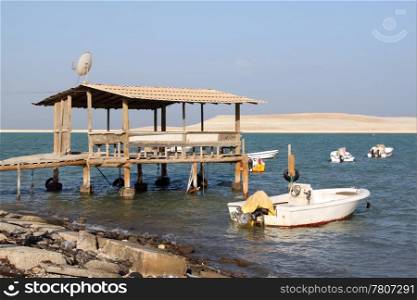Boats and sea shore near Manama city, Bahrein